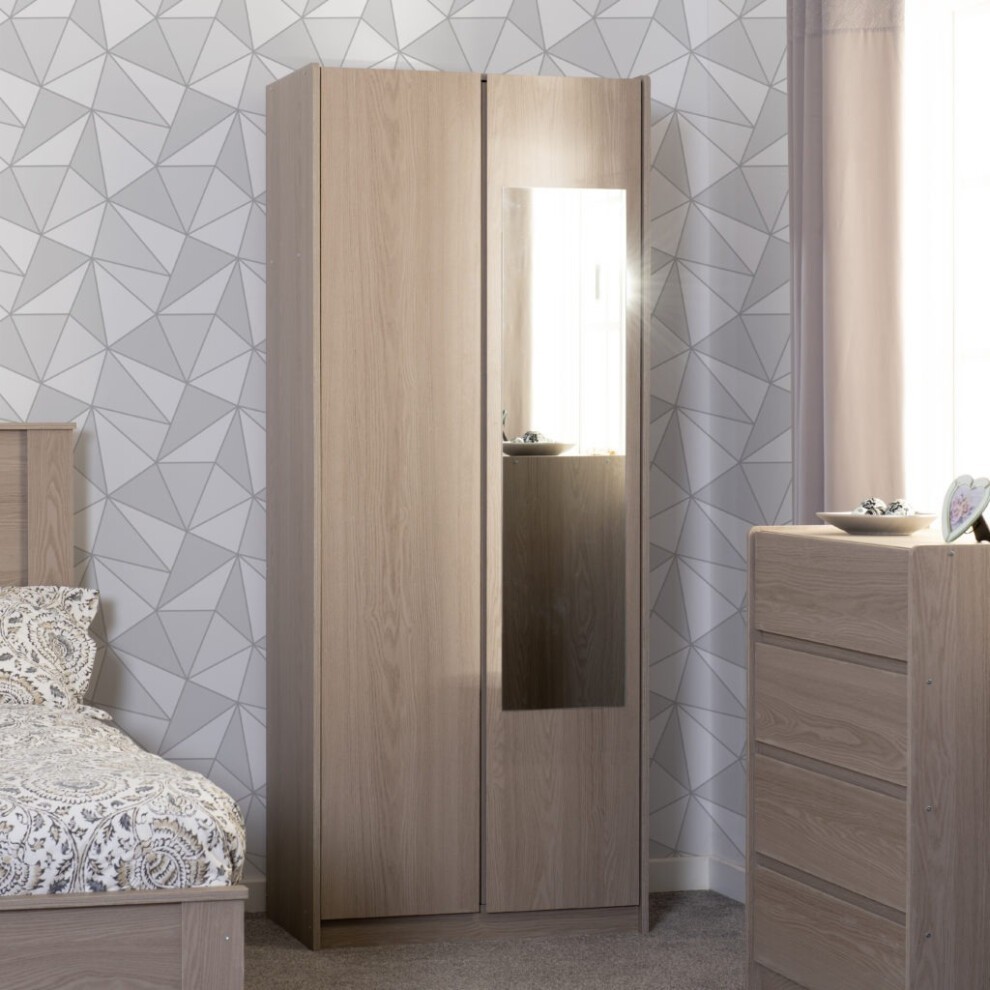 Seconique Paris 2 Door Wardrobe in smoked ash effect featuring a sleek mirrored panel, complemented by a modern geometric wallpaper backdrop.