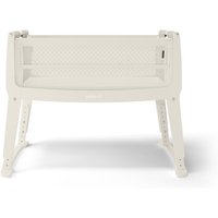 Snüz SnuzPod Studio Bedside Crib in Vienna Cashmere, cream color with mesh sides and sturdy wooden legs.