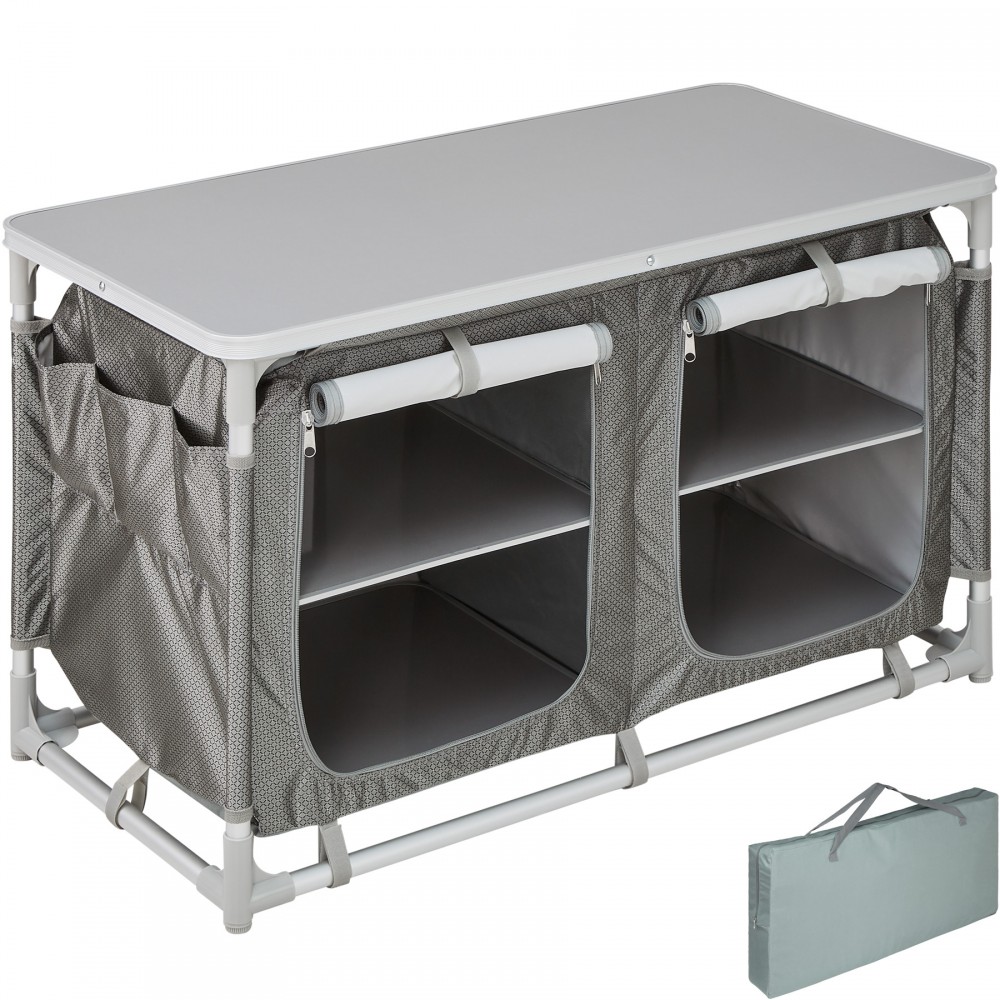 Grey camping kitchen with a sturdy frame, featuring a flat top surface and two open compartments with fabric sides, comes with a matching carry bag for easy transport.