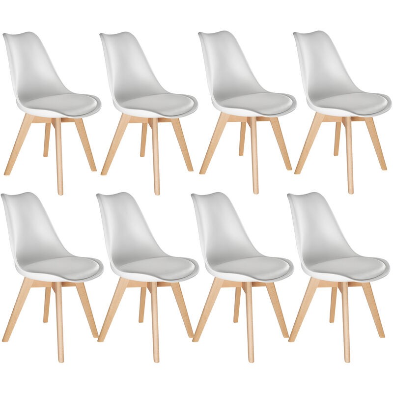 Ensemble de 8 chaises de salle à manger avec sièges rembourrés en blanc et pieds en bois clair, au design moderne et épuré.