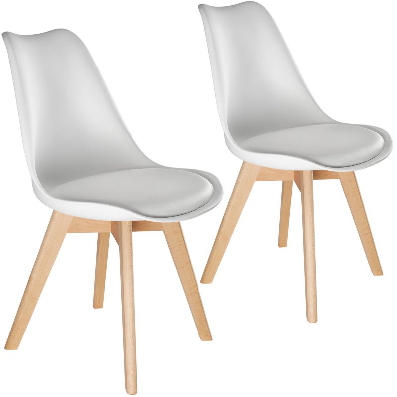 Two modern dining chairs featuring a sleek white plastic seat with a curved backrest, supported by light wooden legs for a stylish and contemporary look.