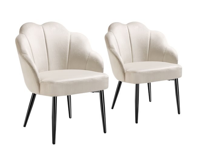 Cream velvet accent chairs with a padded, extra-wide shell-shaped backrest and sleek black legs, designed for comfort and style.