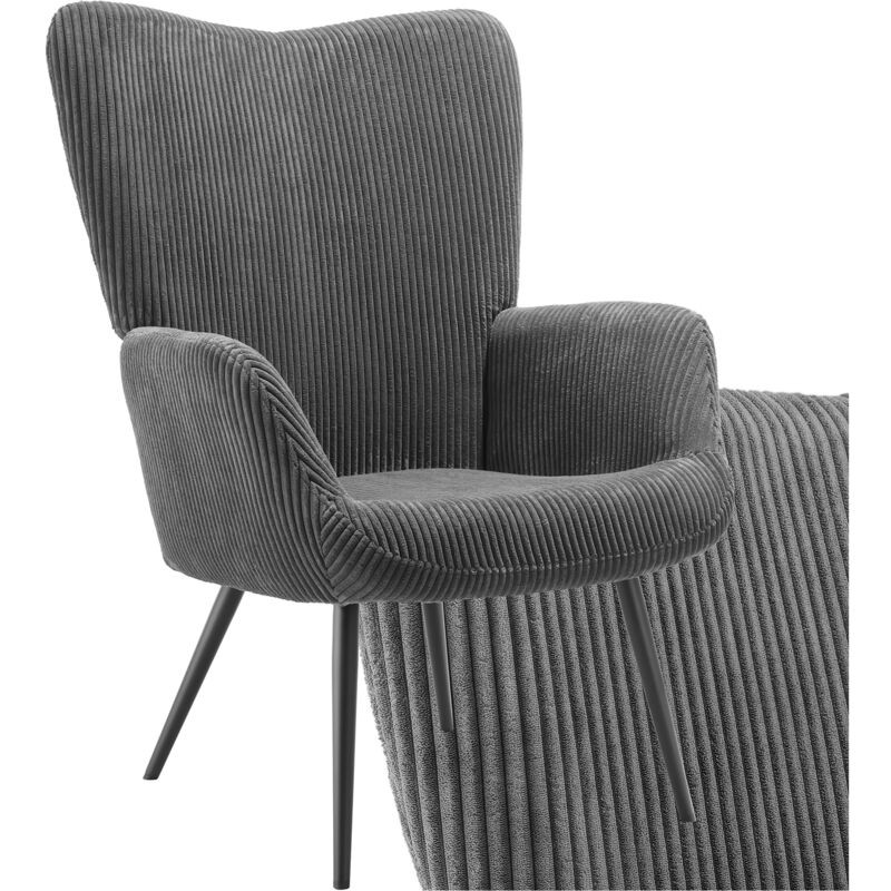 Armchair in wide cord fabric, featuring an anthracite and black color scheme, with a high back and sleek black legs, designed for comfort and a cozy aesthetic.