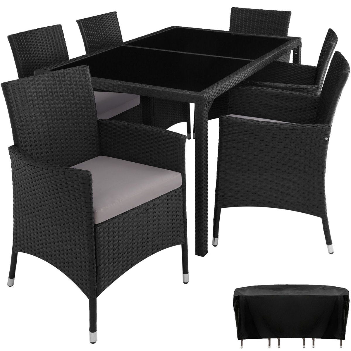 Black rattan dining set with six chairs and a rectangular table, featuring a protective cover, designed for outdoor use with cushioned seats.