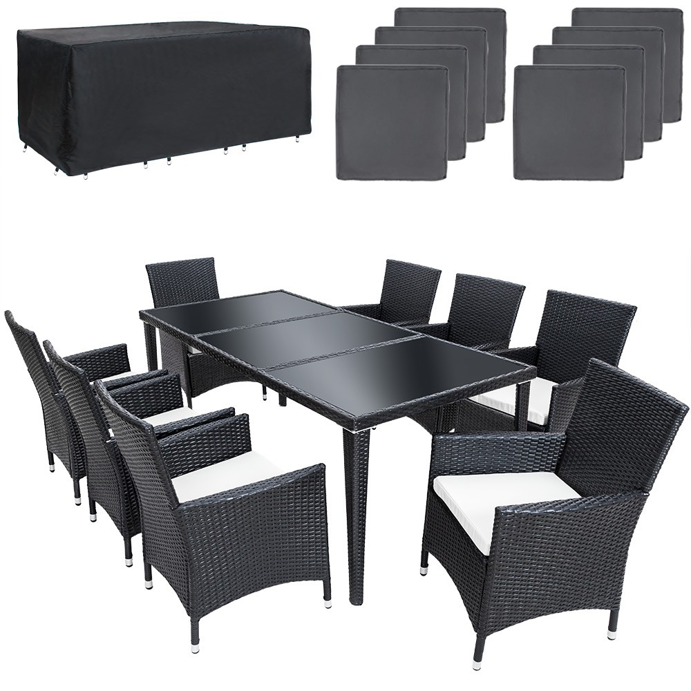 Black rattan 8-seater furniture set with a glass-top table and white cushioned chairs, accompanied by a protective black cover.