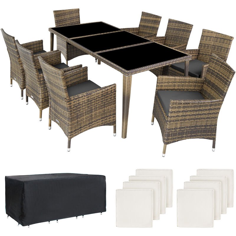 Brown and cream rattan 8-seater furniture set featuring a rectangular table with a glass top, eight cushioned chairs, and a protective black cover.
