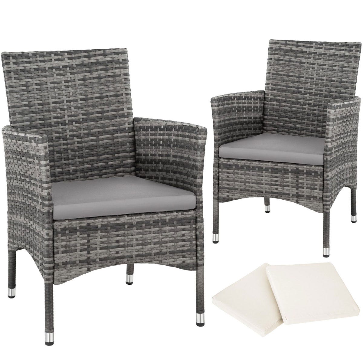 Two dark grey rattan garden chairs with grey seat cushions, accompanied by four matching seat covers, showcasing a modern and stylish outdoor design.