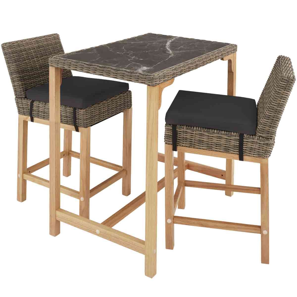 Brown wooden bar table with a marble-patterned top, accompanied by two woven bar stools with black cushions. Ideal for outdoor or indoor settings.