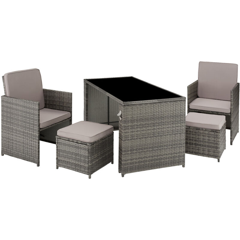 Grey rattan seating set featuring two armchairs, a square table with a glass top, and a matching ottoman, all with soft grey cushions for comfort.