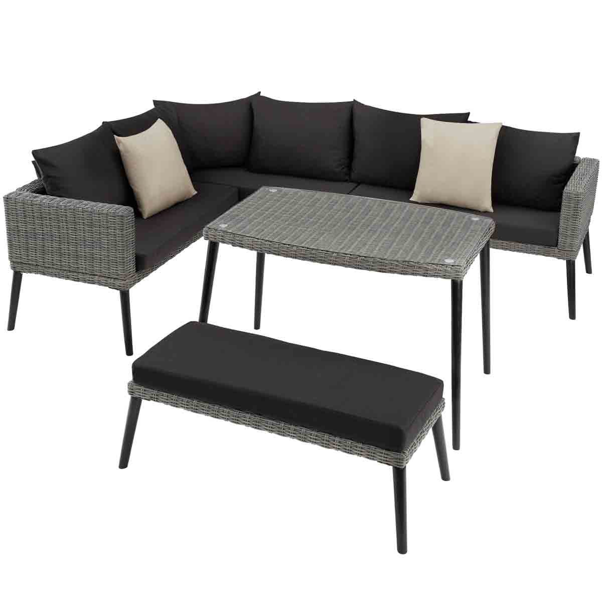 Grey rattan garden lounge set featuring a corner sofa bench, a coffee table with a textured surface, and black cushions, complemented by two beige accent pillows.
