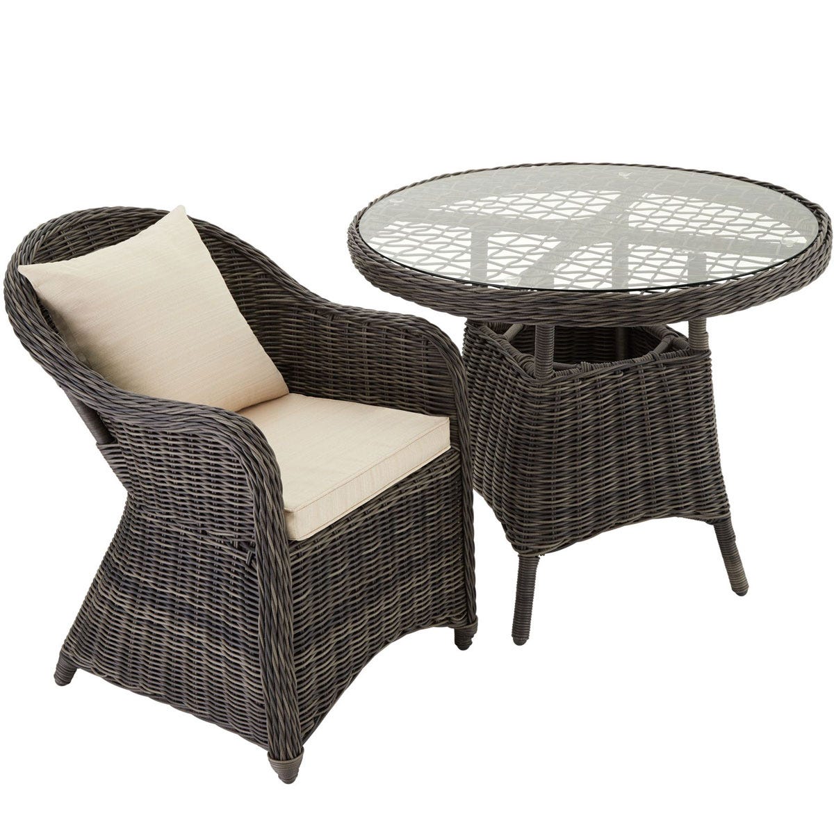 Grey rattan bistro set featuring three armchairs with cream cushions and a round glass-top table, designed for outdoor or indoor use.