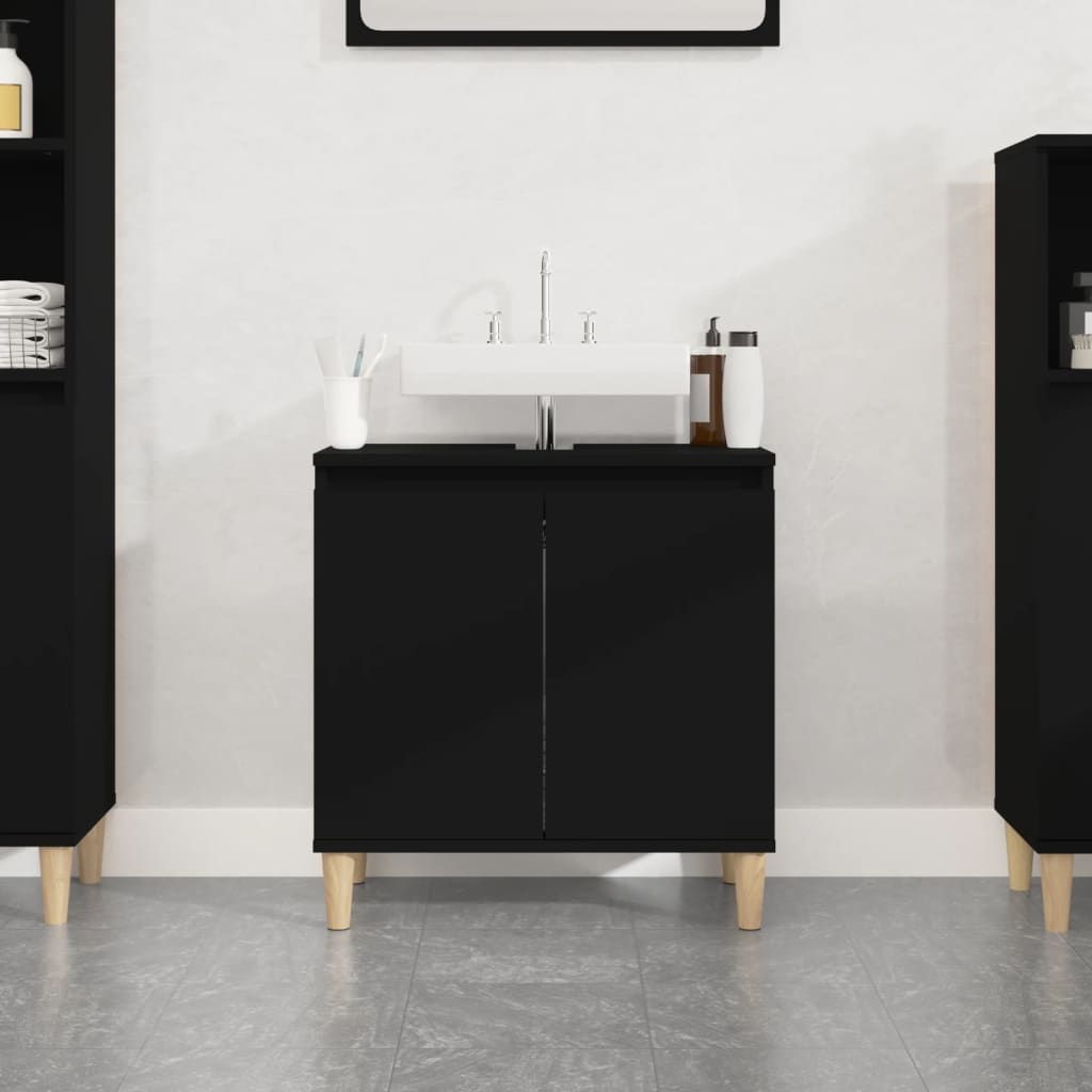 Black sink cabinet made of engineered wood, measuring 58x33x60 cm, featuring two doors, wooden legs, and a sleek design, ideal for modern bathrooms.