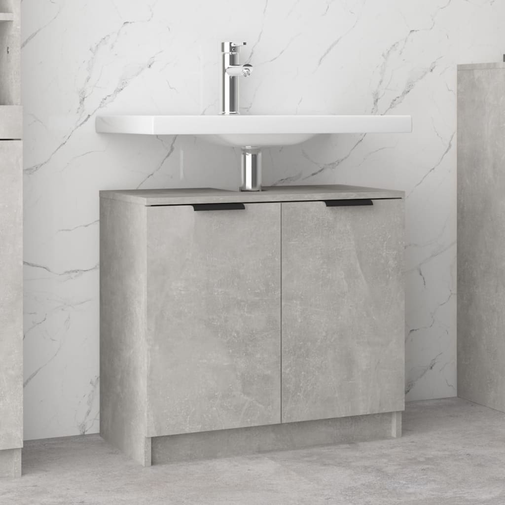 Concrete grey bathroom cabinet made of engineered wood, featuring two doors with black handles and a sleek, modern design, ideal for stylish storage solutions.