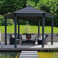 Grey hexagonal garden gazebo with a peaked roof, six columns, and open sides, set on a wooden deck.