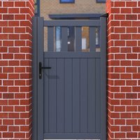 Grey metal side gate with partial privacy slats, black handle, set between red brick pillars.