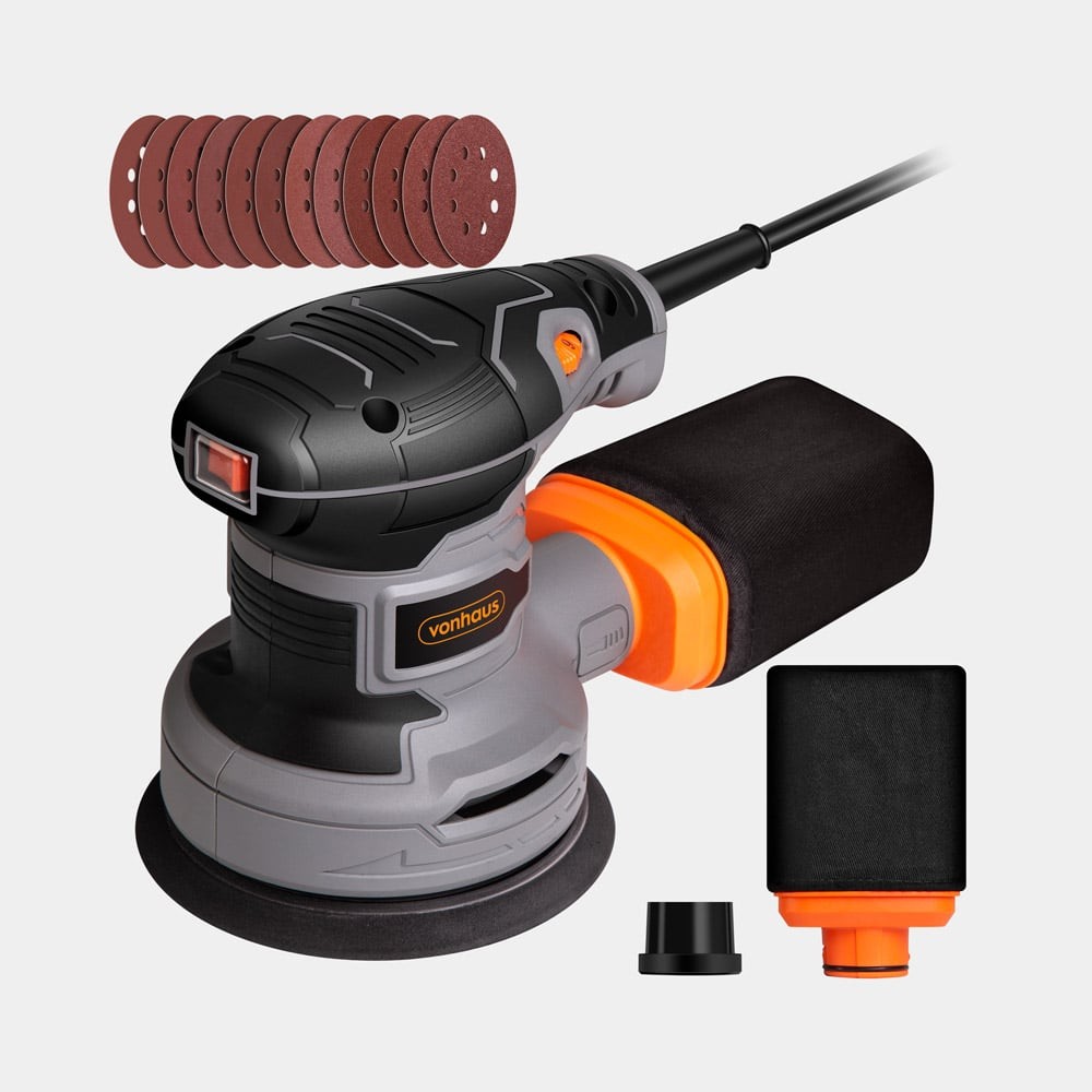 300W random orbital sander in black and gray with an orange accent, featuring a rubberized grip, dust collection system, and includes sanding discs.