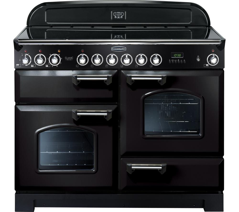 Classic Deluxe 110cm ceramic range cooker in black with chrome trim, featuring six control knobs, digital display, and two glass-fronted ovens.