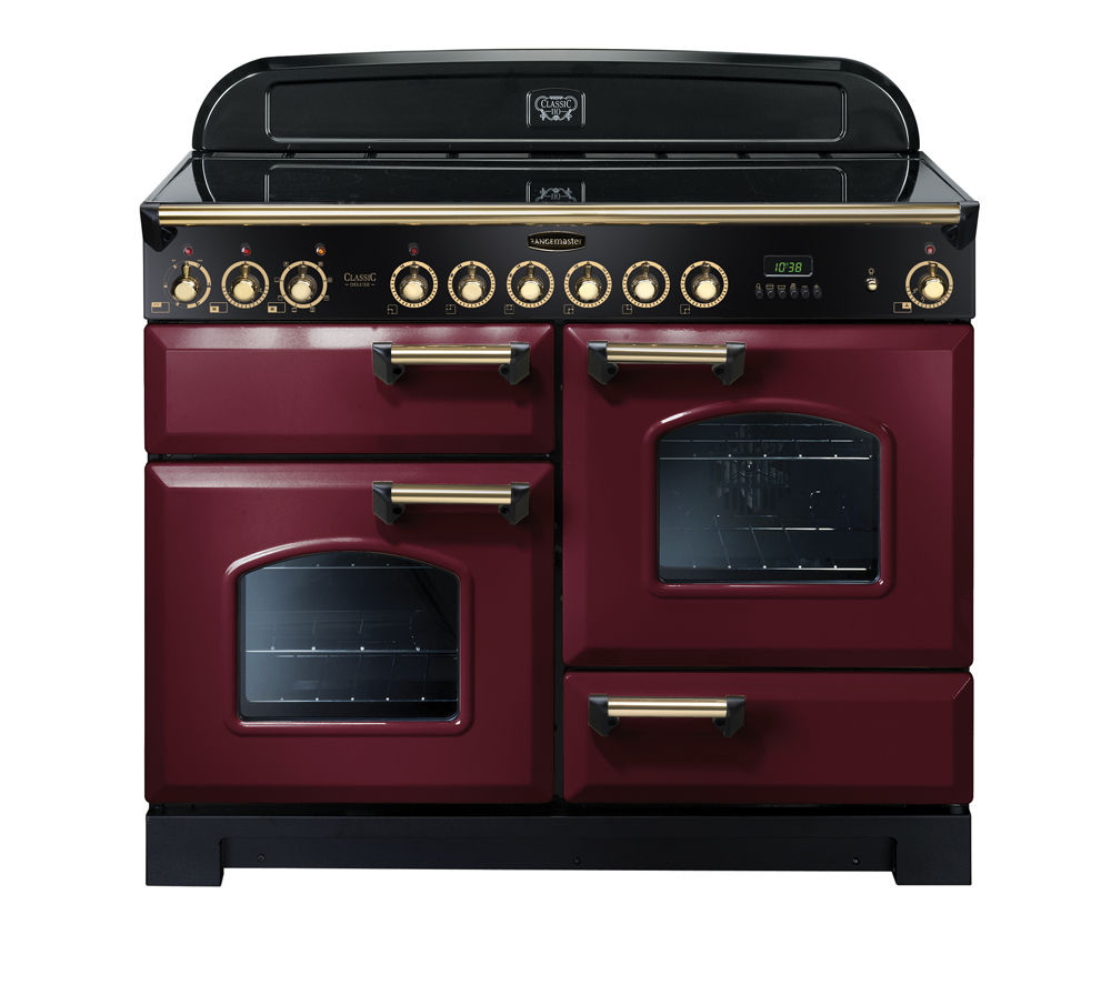 Classic 110cm ceramic range cooker in cranberry with brass trim, featuring two ovens, five burners, and a sleek black control panel with brass knobs.