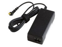 Black Acer power adapter with a 65W output, featuring a rectangular design, a power cable, and a round connector tip.
