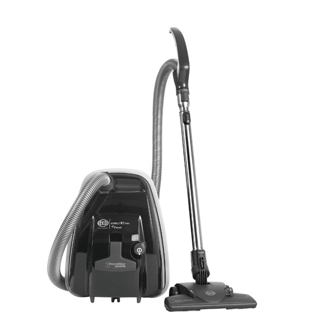 Black Sebo 92662GB Airbelt K1 Pro EPower Cylinder Vacuum Cleaner with a sleek design, flexible hose, and a floor nozzle attachment.