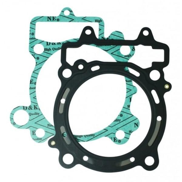 Apico Head & Base Gasket Kit featuring a black base gasket and a green head gasket with printed text, designed for Suzuki RM125 models from 1997 to 2008.