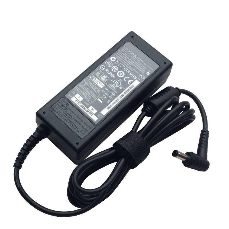 Black ASUS 65W power adapter with a rectangular shape, featuring a textured surface, multiple certification labels on the back, and a coiled power cord with a cylindrical connector.