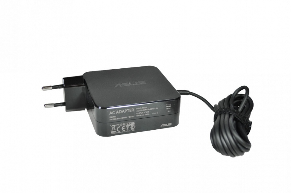 Black ASUS 65W power adapter with a compact design, featuring two prongs for wall connection and a coiled black cable for easy management.