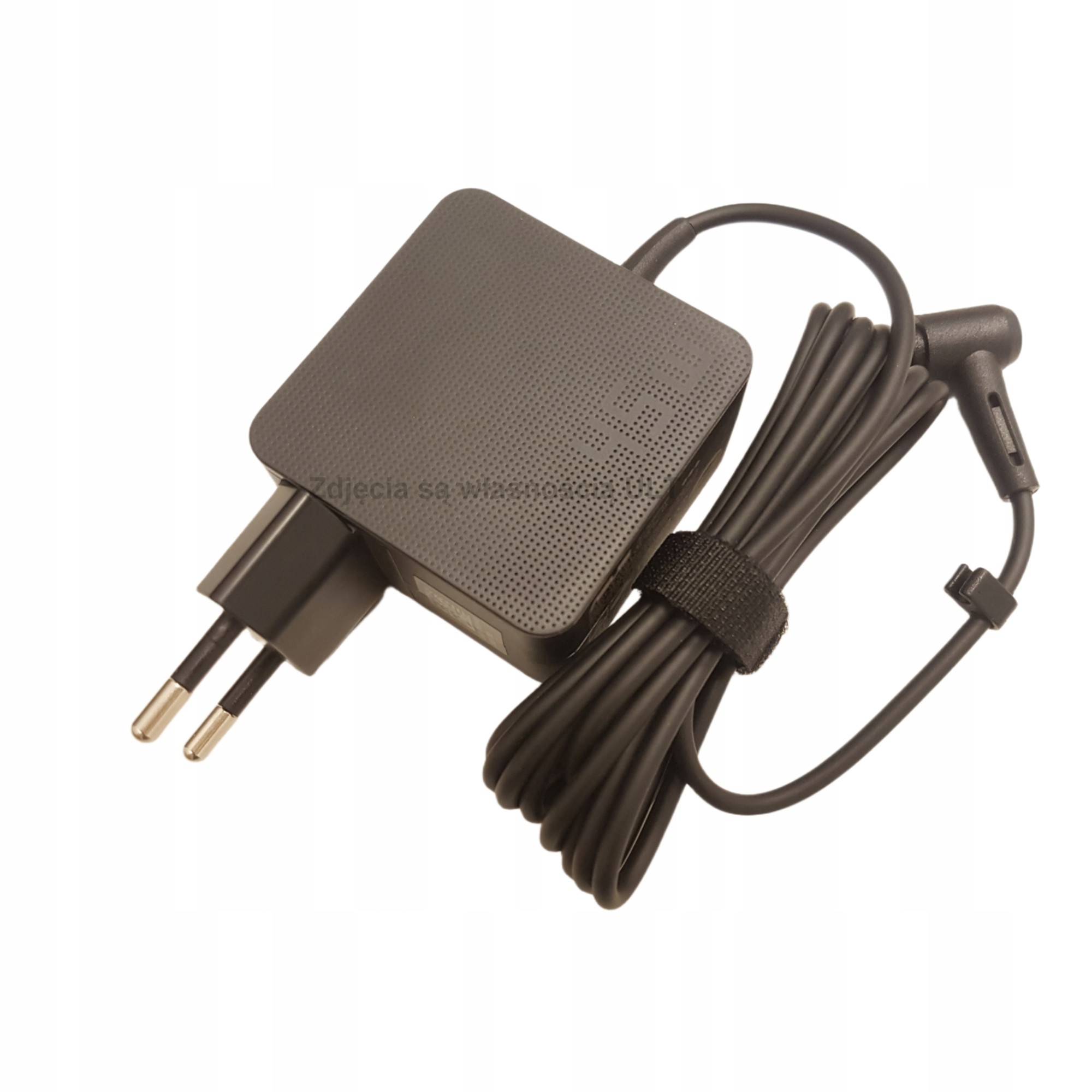 Black ASUS 45W power adapter with a textured surface, two-prong plug, and a long cable featuring a connector for devices.