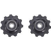 Black BBB RollerBoys Jockey Wheels 11T with silver center bearings and toothed edges, set of two.