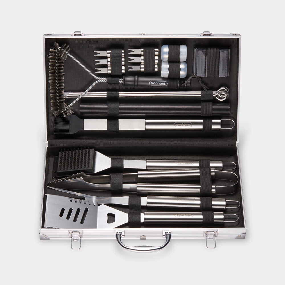 Silver 25-piece BBQ tool set by VonHaus, featuring stainless steel utensils including a spatula, tongs, and grill brush, neatly organized in a durable case with a secure handle.