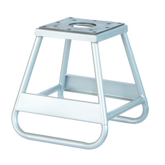 Fixed height paddock stand in silver metal, featuring a square top with a central hole, supported by a sturdy, angled frame for stability.