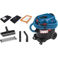 Bosch blue and black wet and dry vacuum dust extractor with wheels, hose, and various attachments.
