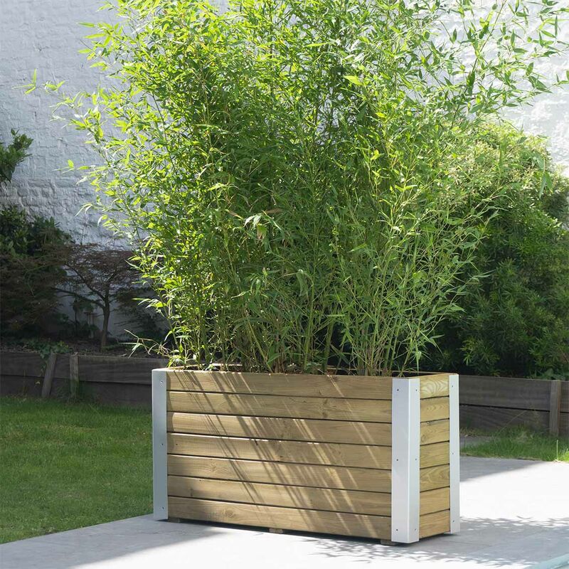 Rectangular wooden planter in brown, measuring 100cm, features a slatted design with metal corner accents, showcasing lush green bamboo plants inside.