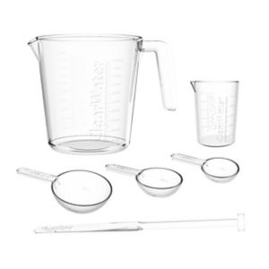 Clearwater Measuring Set includes a large clear plastic measuring cup with a handle and three clear measuring spoons, all designed for precise chemical treatment in pools and hot tubs.