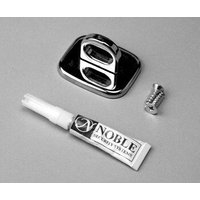 Silver Compulocks anchoring point with adhesive tube and screws for security cable locks.