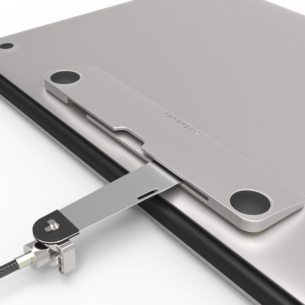 Silver T-Bar security lock designed for MacBooks, tablets, and ultrabooks, featuring a sleek metal finish and a secure attachment mechanism for device protection.