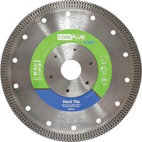 Coreplus Turbo Diamond Blade for hard tile, silver with green and blue label, perforated edges, central hole.