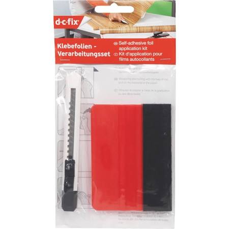 Self-adhesive applicator kit featuring a black and red squeegee and a cutting tool, packaged with instructions for easy application of adhesive films.