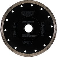 Black Draper Expert Turbo-X diamond blade, 180mm, with circular holes and textured edge for cutting porcelain.