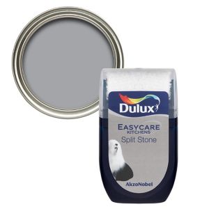 Dulux Easycare Kitchen Split Stone Flat Matt Emulsion Paint tester pot, featuring a grey color with a smooth finish, labeled with product details and a silver lid.