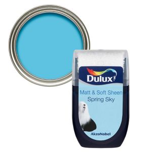 Dulux Spring Sky Vinyl Matt Emulsion Paint in a 30ml tester pot, featuring a vibrant light blue color with a smooth finish, packaged in a clear plastic container with a silver lid.