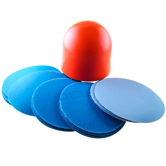 Red rubber sanding tool with a rounded top, surrounded by several blue circular sanding discs, showcasing a durable material ideal for detailed engineering work.
