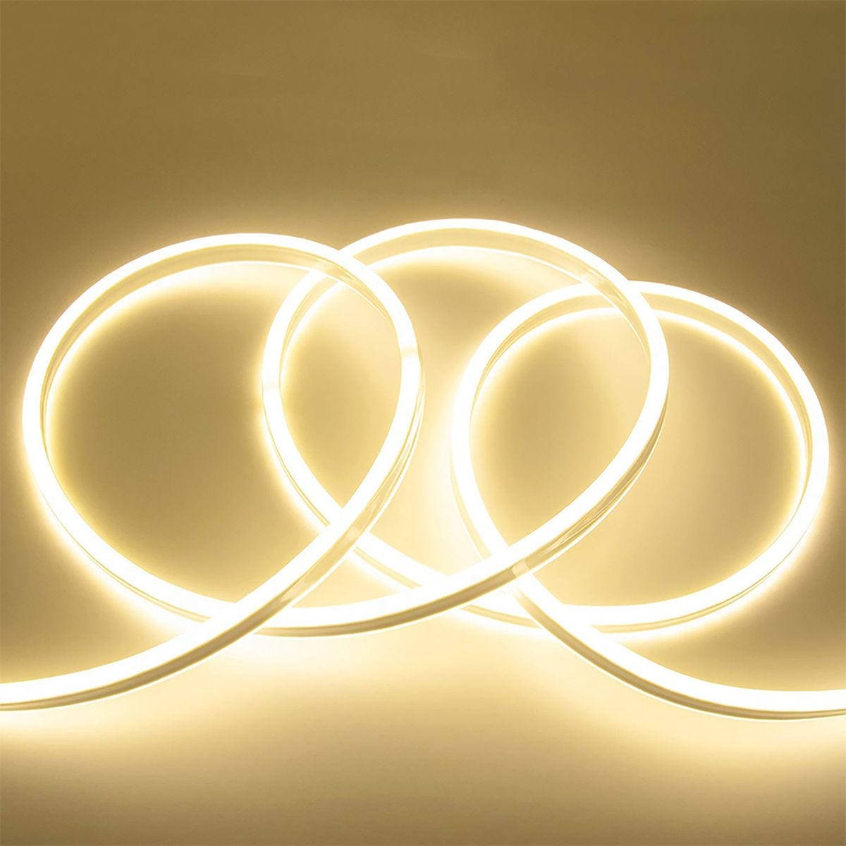 Flexible 12V LED neon strip in warm white (4000K), 3 meters long with a 6x12mm silicon casing, featuring 120 LEDs per meter, includes 4 wall clips and a 5A adapter.