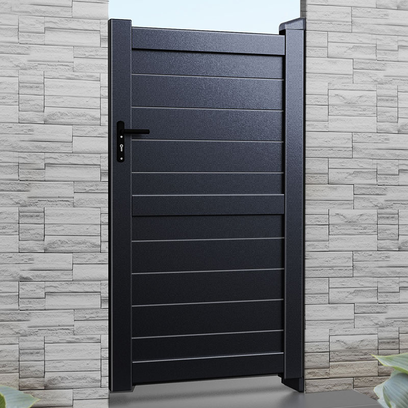Black metal side gate with a sleek, horizontal slat design and a black handle, set against a light stone wall, showcasing durability and modern aesthetics.