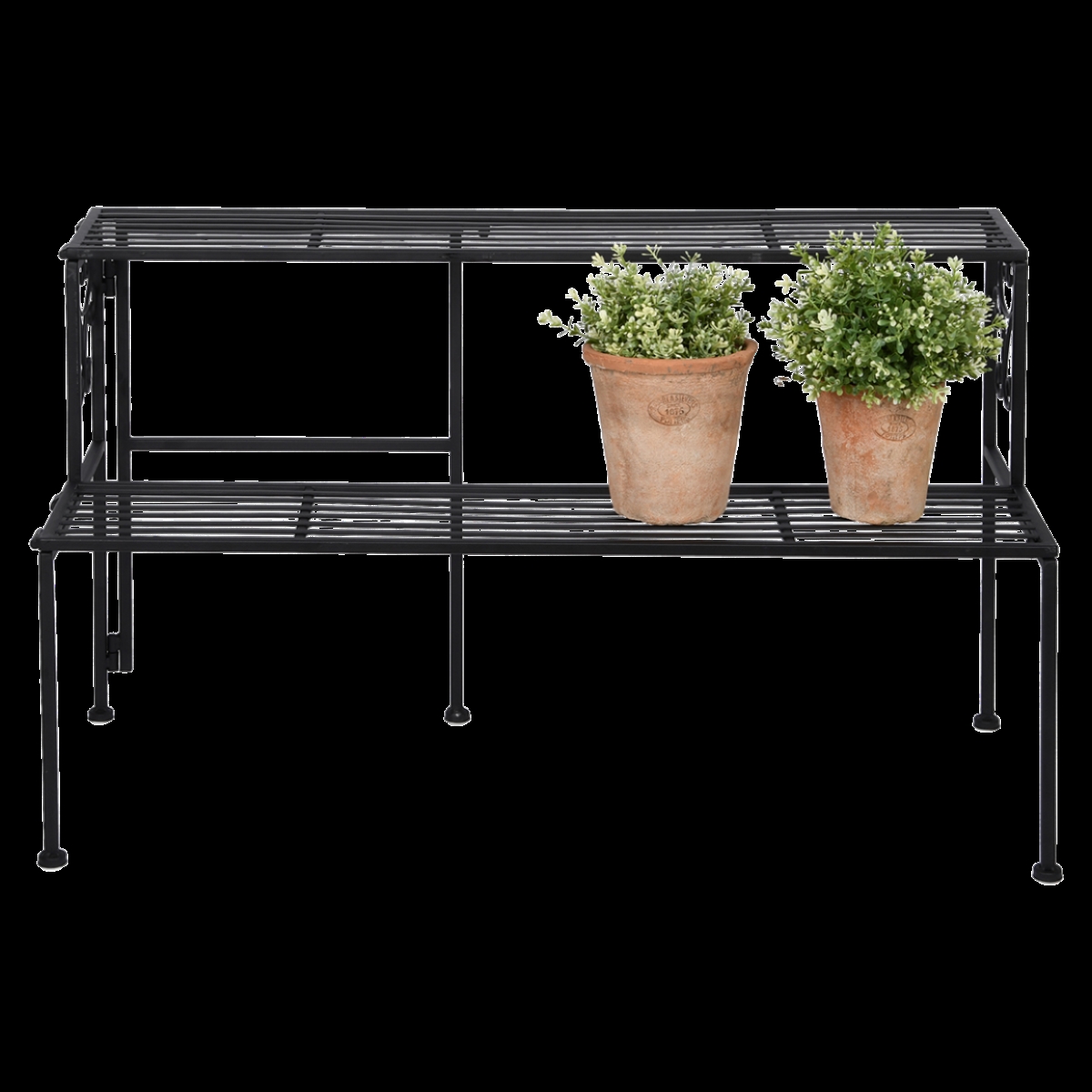 Black iron two-shelf folding stand featuring a slatted design, with two potted plants on the top shelf, ideal for indoor or outdoor use.