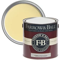 Farrow & Ball Exterior Eggshell paint can, Dayroom Yellow No. 233, with a sample of soft yellow paint on the lid.
