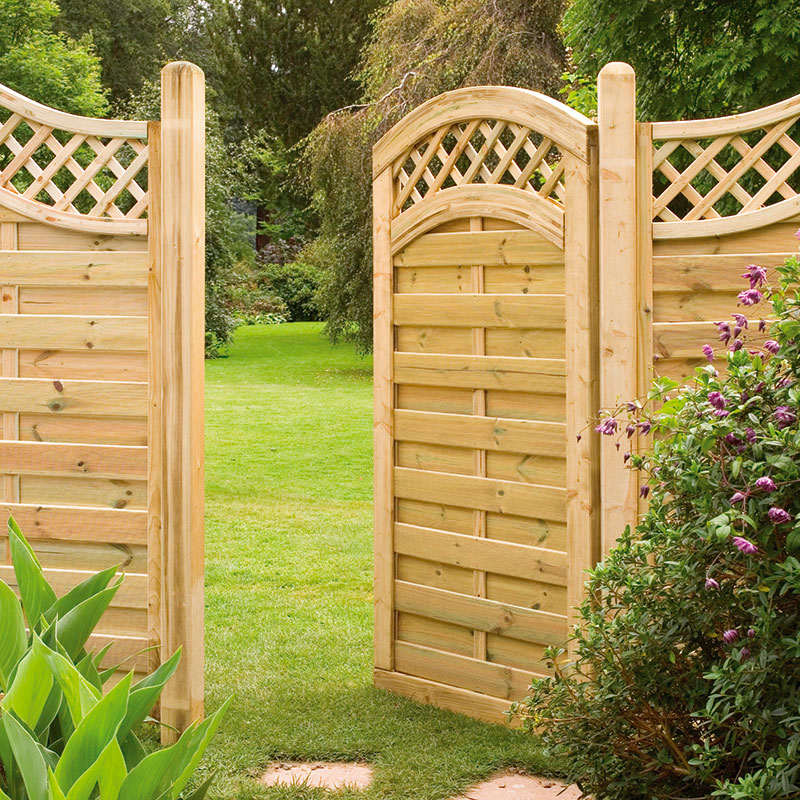 1.8m high wooden Prague Gate by Forest Garden, featuring a natural finish, lattice top design, and horizontal slats, set against a lush green garden backdrop.