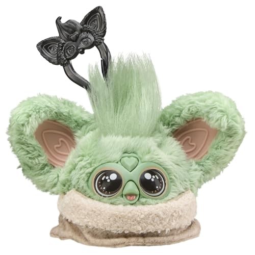 Green plush electronic pet resembling Grogu from Star Wars, featuring large eyes, soft fur, oversized ears, and a beige collar, topped with a black hair accessory.