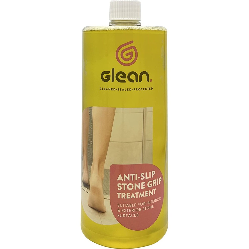 Clear plastic bottle of GLEAN Anti-Slip Stone Grip Treatment, 1 litre, with yellow liquid, featuring a logo and text on a white background, indicating it enhances traction on stone surfaces.