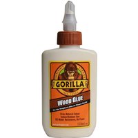 Gorilla PVA Wood Glue in beige bottle with brown cap and orange label featuring a gorilla logo.
